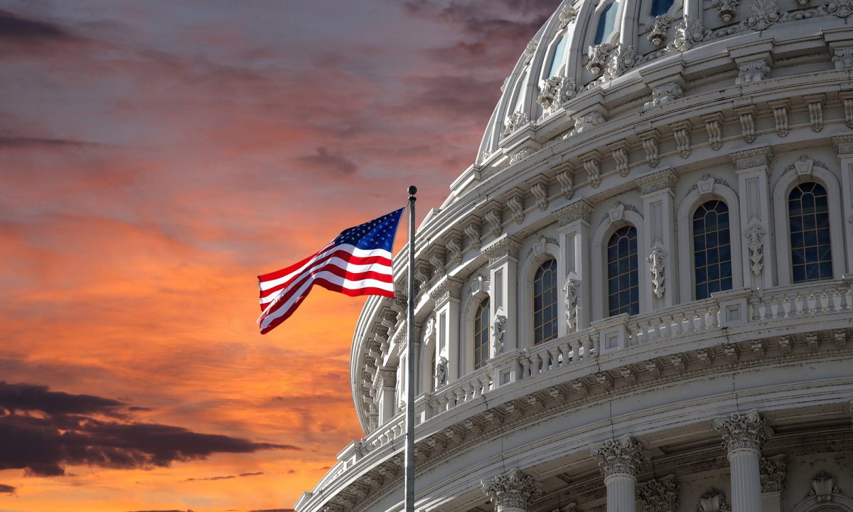 Sunset sky over the US Capitol building dome in Washington DC.