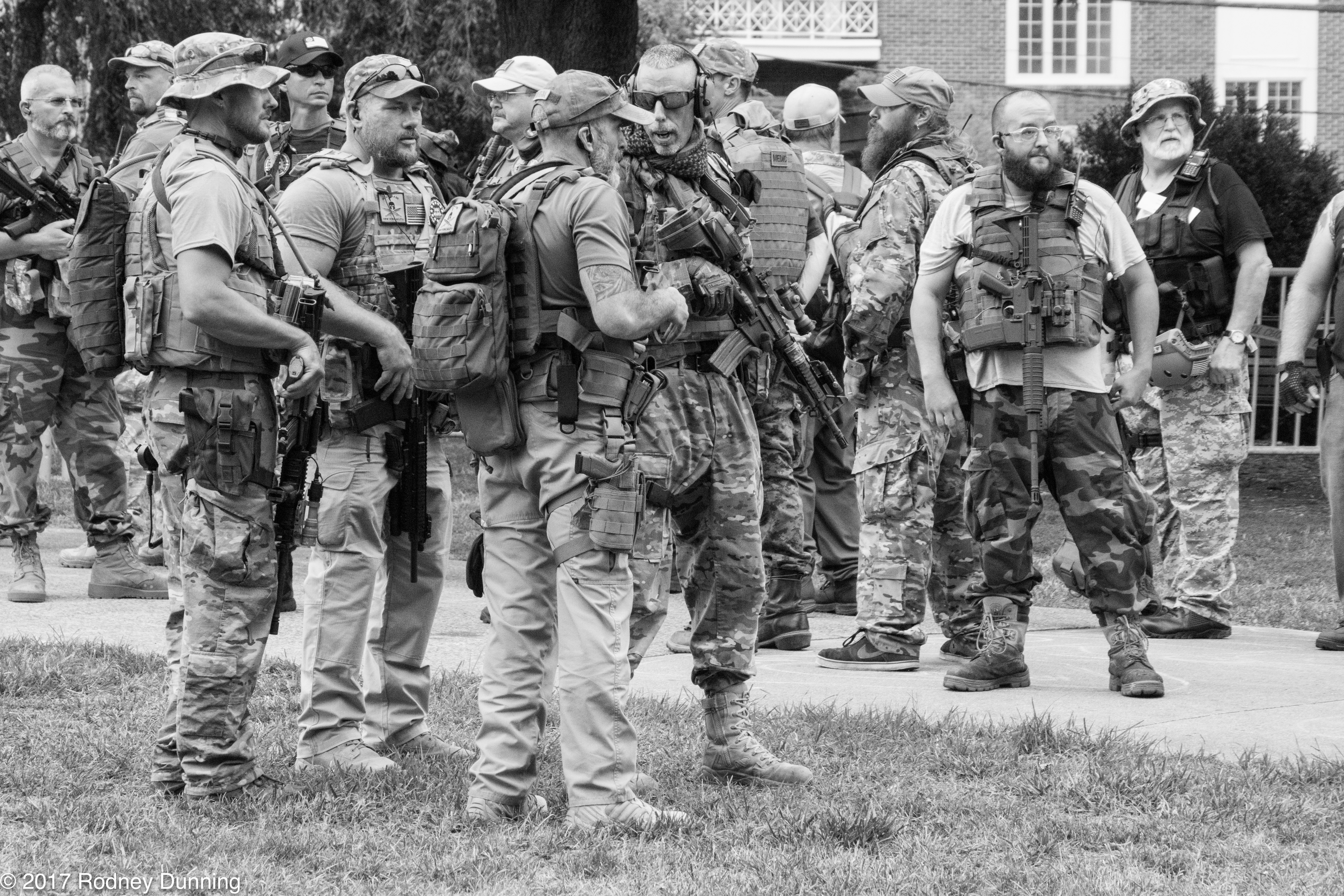 armed militia in camoflage