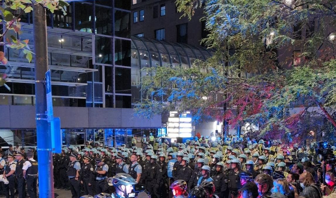 Hundreds of Chicago police officers confront a protest at the 2024 DNC.
