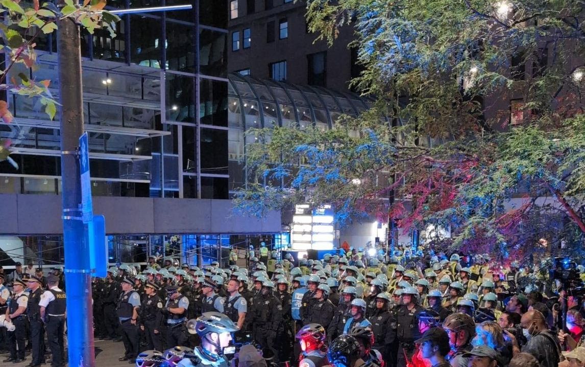 Hundreds of Chicago police officers confront a protest at the 2024 DNC.